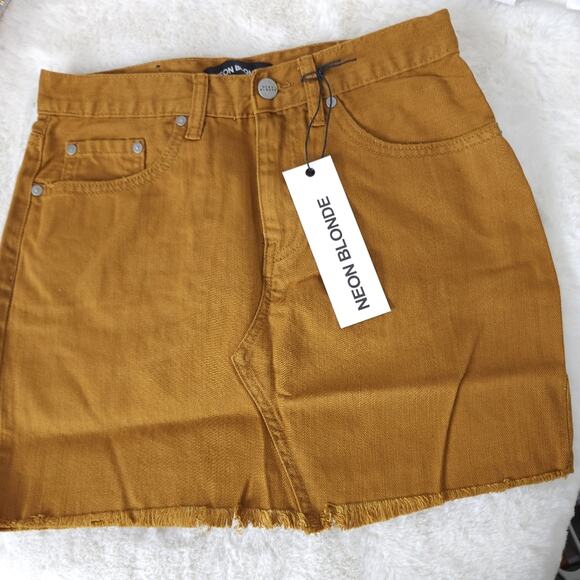 NEON BLONDE Dresses & Skirts - Neon Blonde Tease Distressed Denim Mini Skirt NWT Wild Honey Raw Hem Revolve 24
